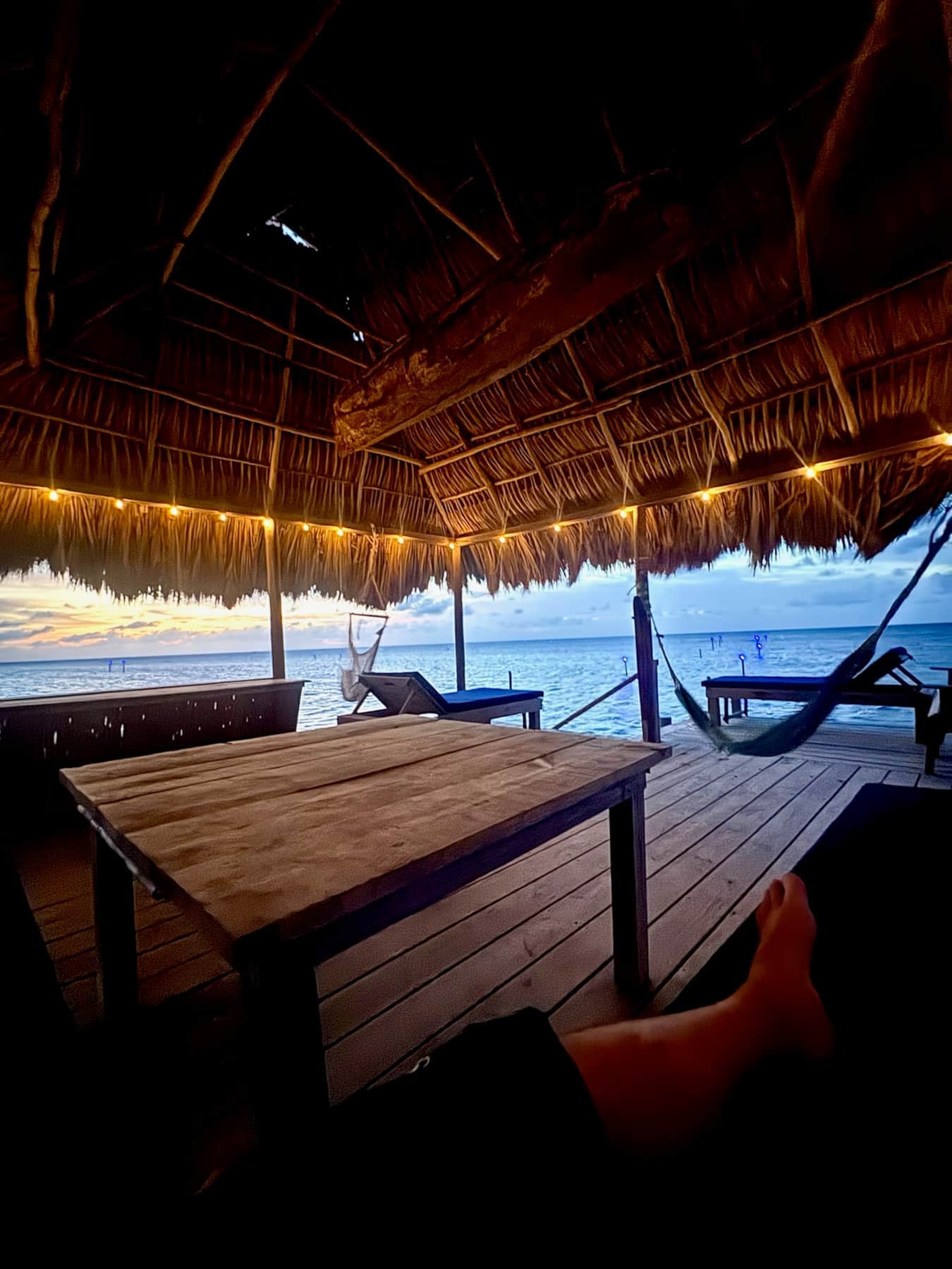 Hammocks under the palapa at dusk