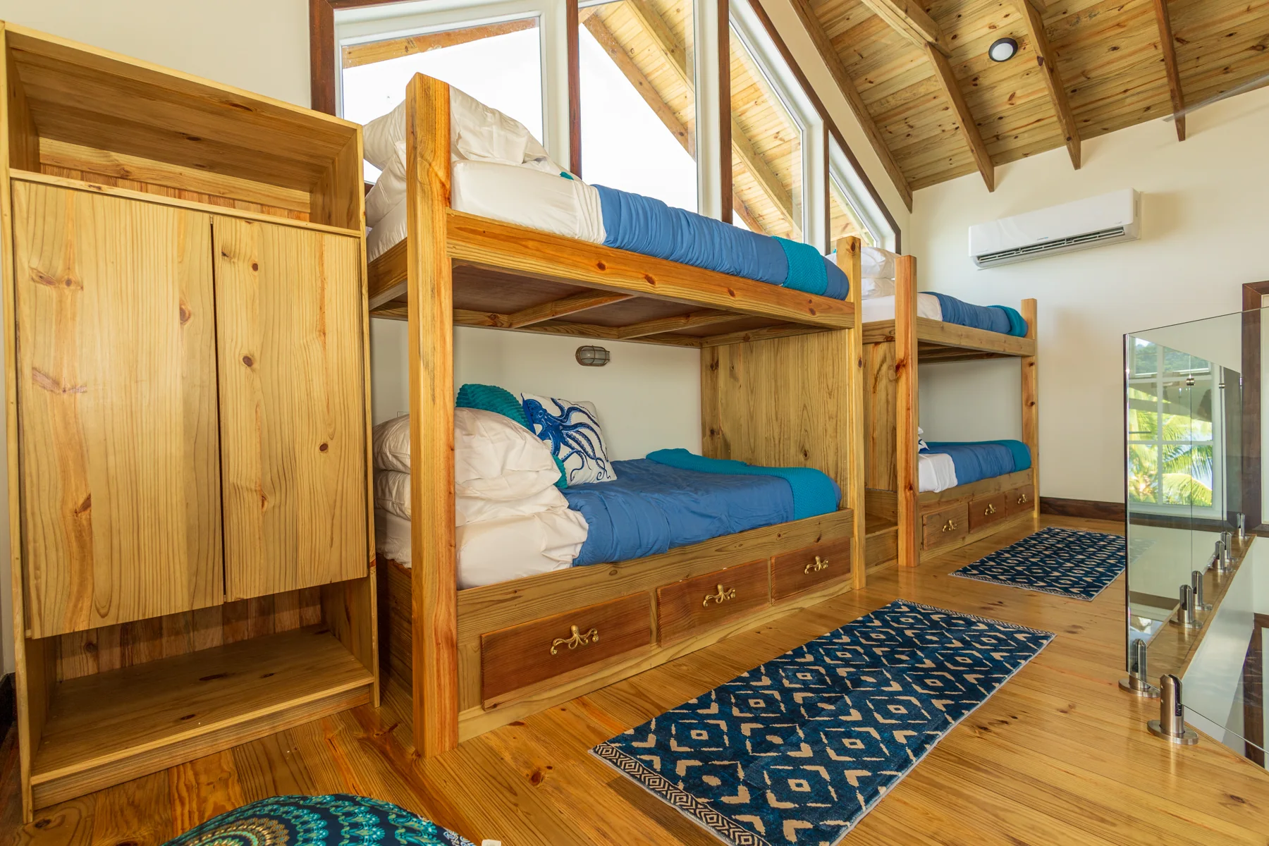 Wooden twin bunk beds in the loft
