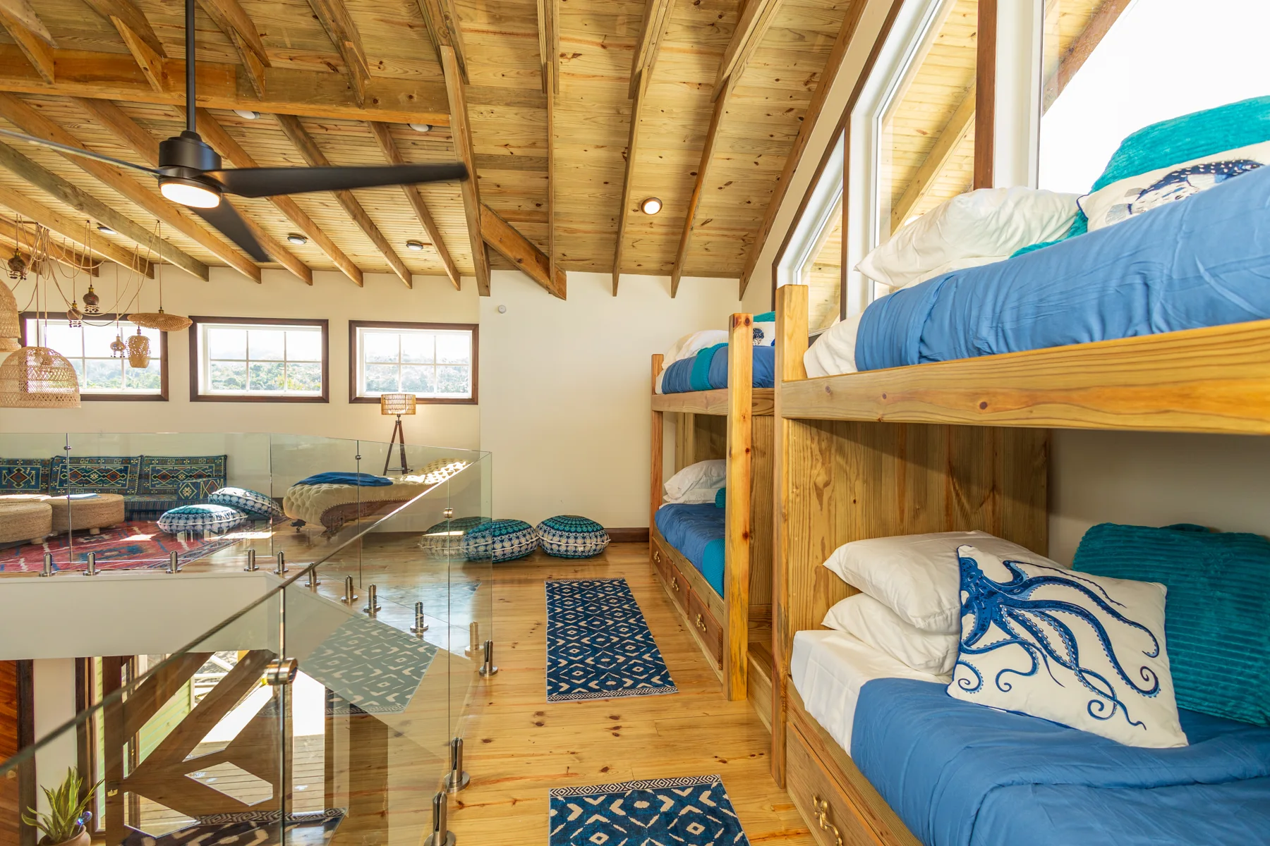 Bunk beds and open stair railing in the loft