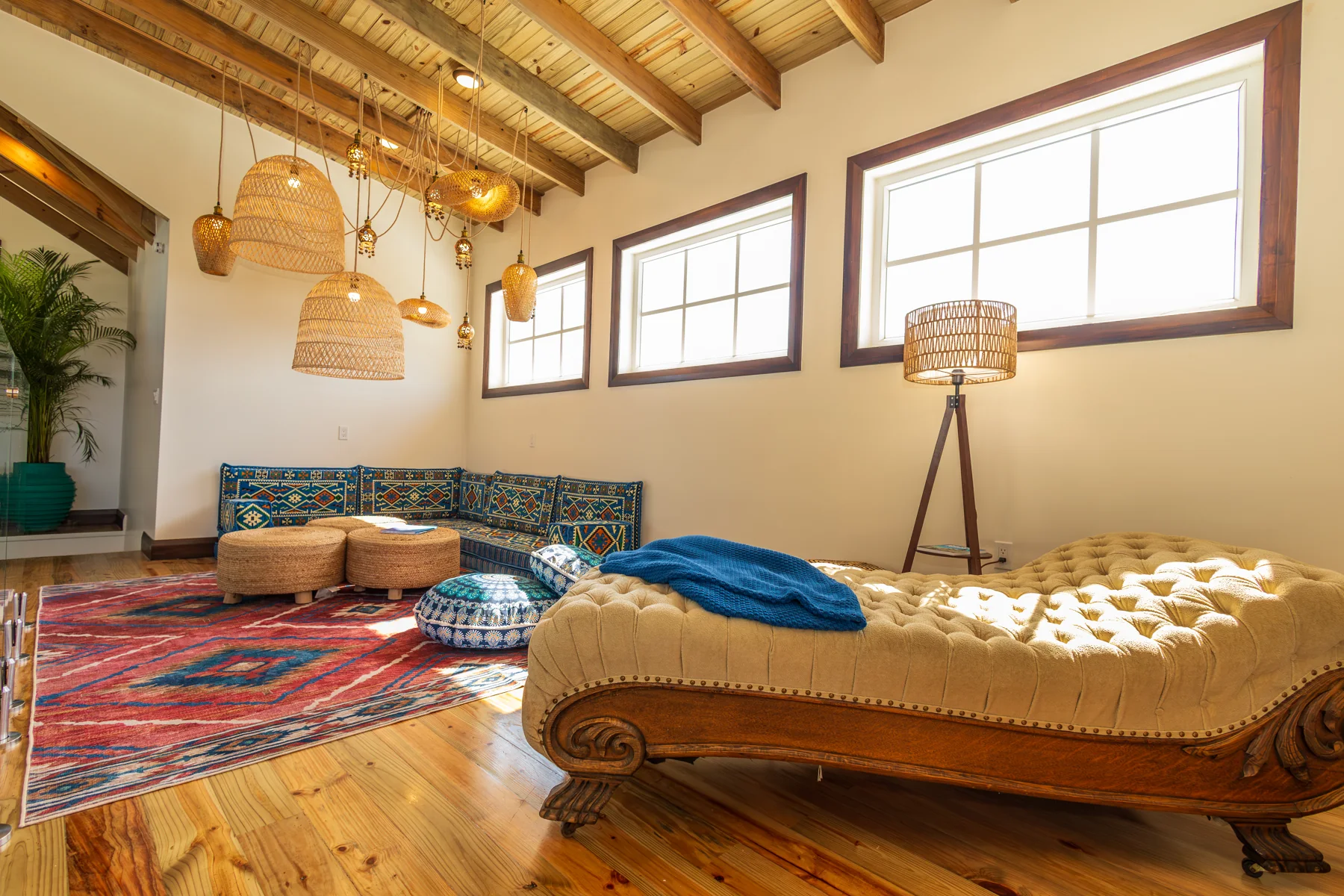 Loft chaise lounge beneath exposed beams