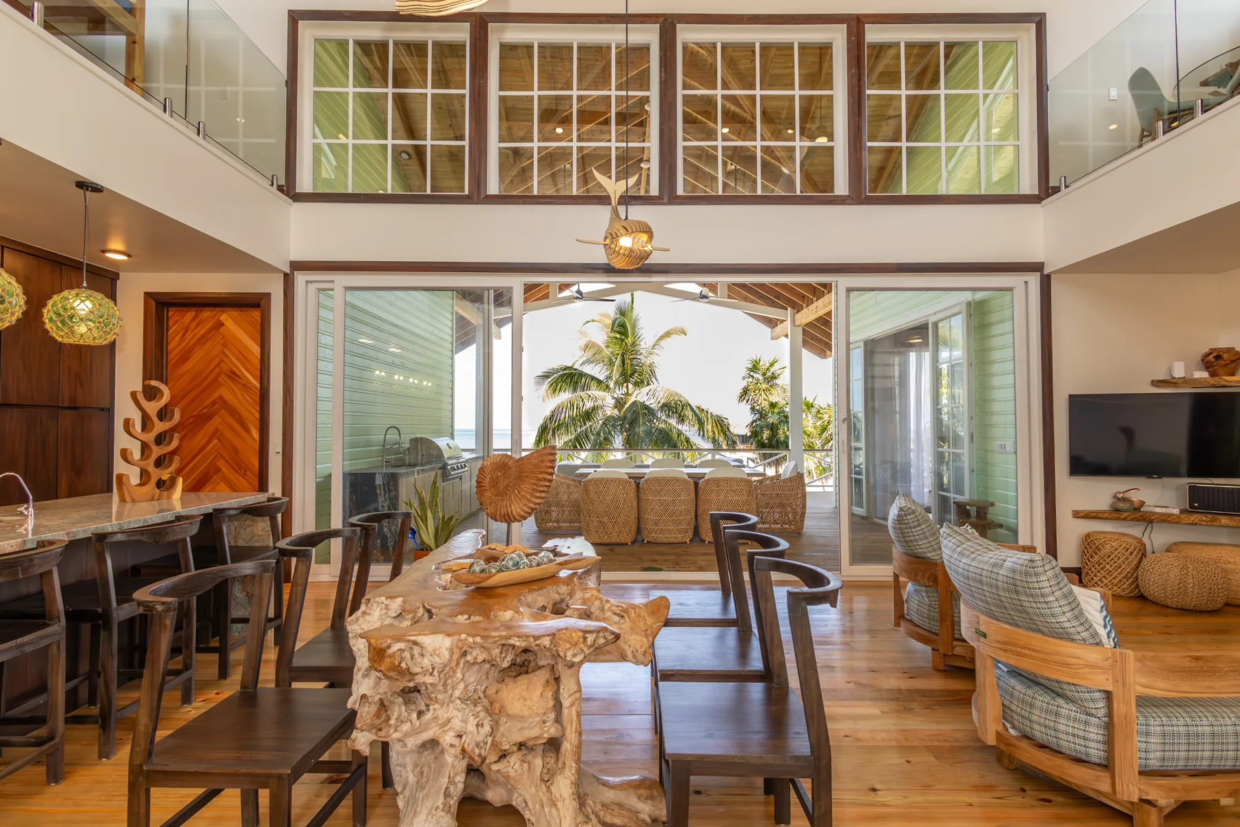Handcrafted dining table looking through the great room